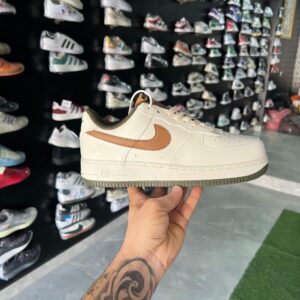 Nike Air Force 1 Guava Linen sneakers.