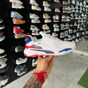Puma RS-X running sneakers with red and blue accents