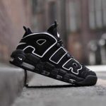 white Nike Air More Uptempo basketball shoes.