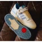 Adidas Forum 84 Low LG shoes in the White Clear Sky colorway.