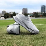 Adidas Supernova Grey White running shoes.