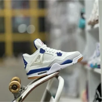 White and blue Nike SB x Air Jordan 4 sneaker