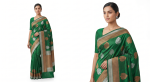 Elegant Emerald Green Saree with Dual-Tone Zari Work